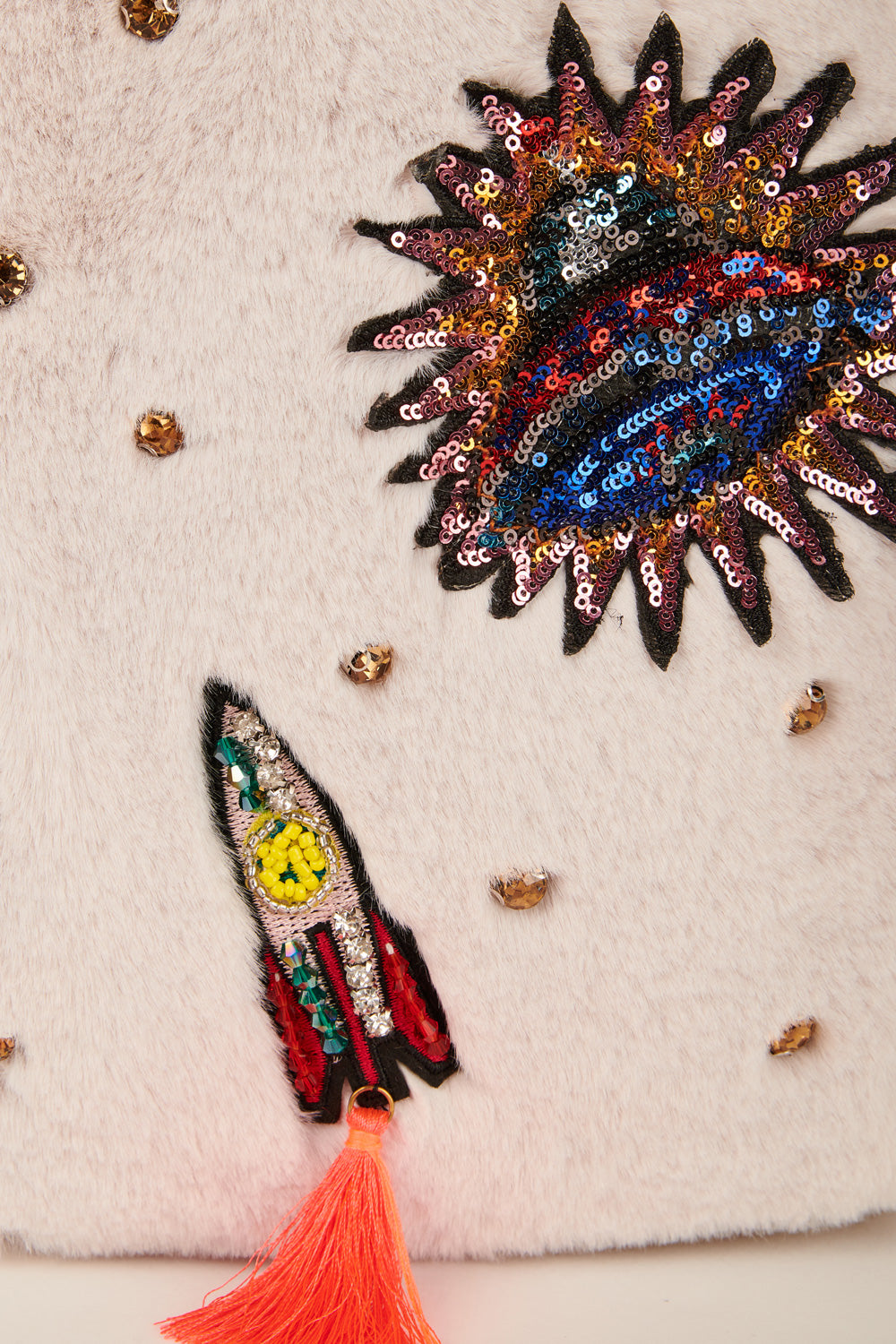 FAUX FUR BACKPACK W/ SPACE THEME PATCHES AND RHINESTONES