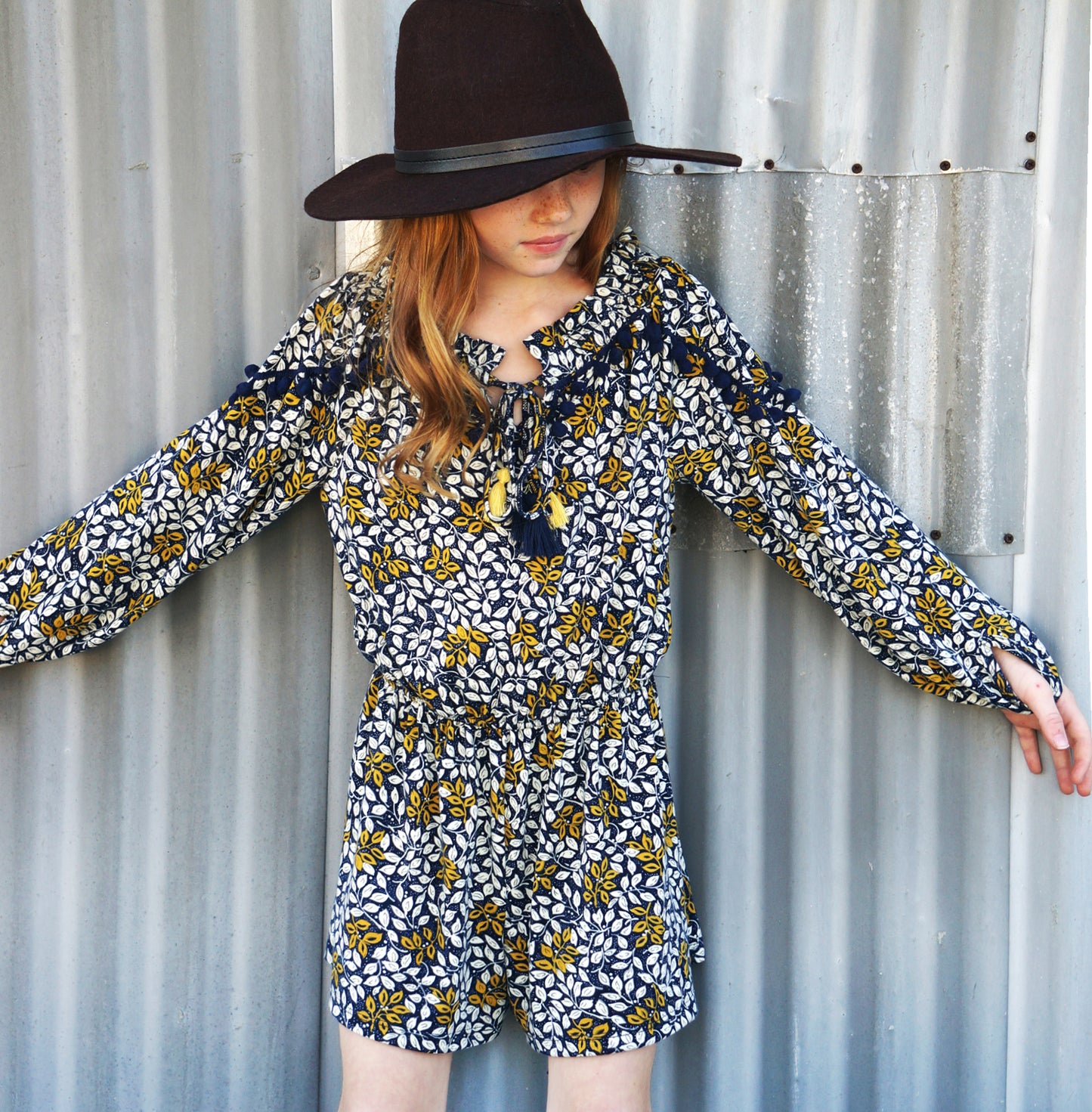 LONG SLEEVE ROMPER WITH COLOR TASSEL TRIM