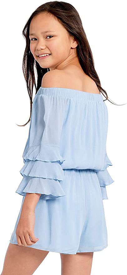 Big Girls Ruffle Sleeve Baby Blue Romper Ruffled Elastic Boat Neck (Can be work on of off the shoulder!) 3/4 Tiered Ruffle Sleeves Drawstring Tassel Tie Waistline The perfect romper for all seasons. SELF: 100% Rayon, LINING: 100% Polyester Rayon gauze fabrication with soft hand-feel.