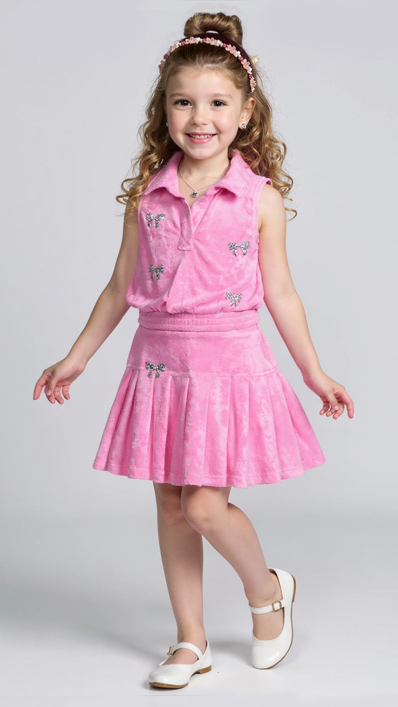 DROP WAIST PLEATED SKIRT W/ SPARLKE BOW TRIM