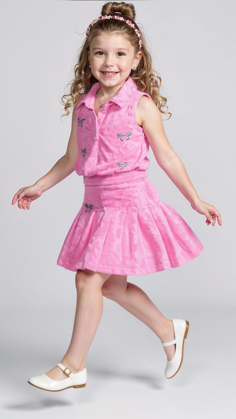DROP WAIST PLEATED SKIRT W/ SPARLKE BOW TRIM