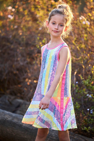 Be the life of the party with this one-of-a-kind Little I Big Girl's Neon Pastel Sequin Candy Stripe Dress! With its dropped waist design and shimmery sequins, this dress will have all the little ones looking fly and fabulous! Let your lil' cutie stun the crowd and feel like the coolest kid on the block. How sweet!  Rounded Scoop Neckline  Sleeveless  Dropped Waist  Shimmering Sequin All Over  Neon Pastel Candy Stripes
