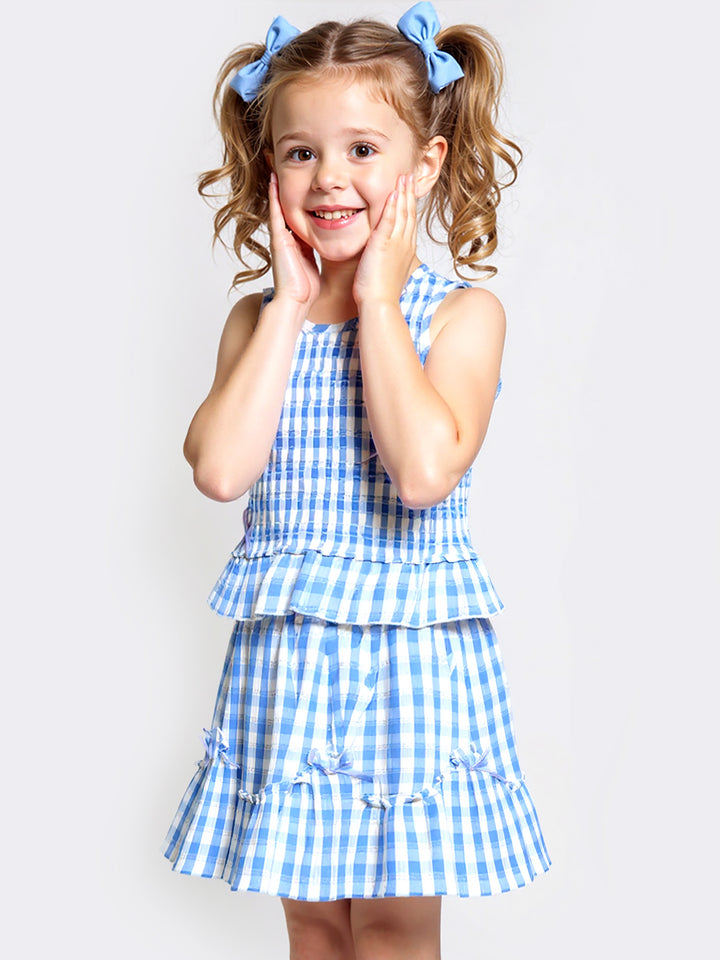 SMOCKED GINGHAM TOP W/ BOW DETAIL
