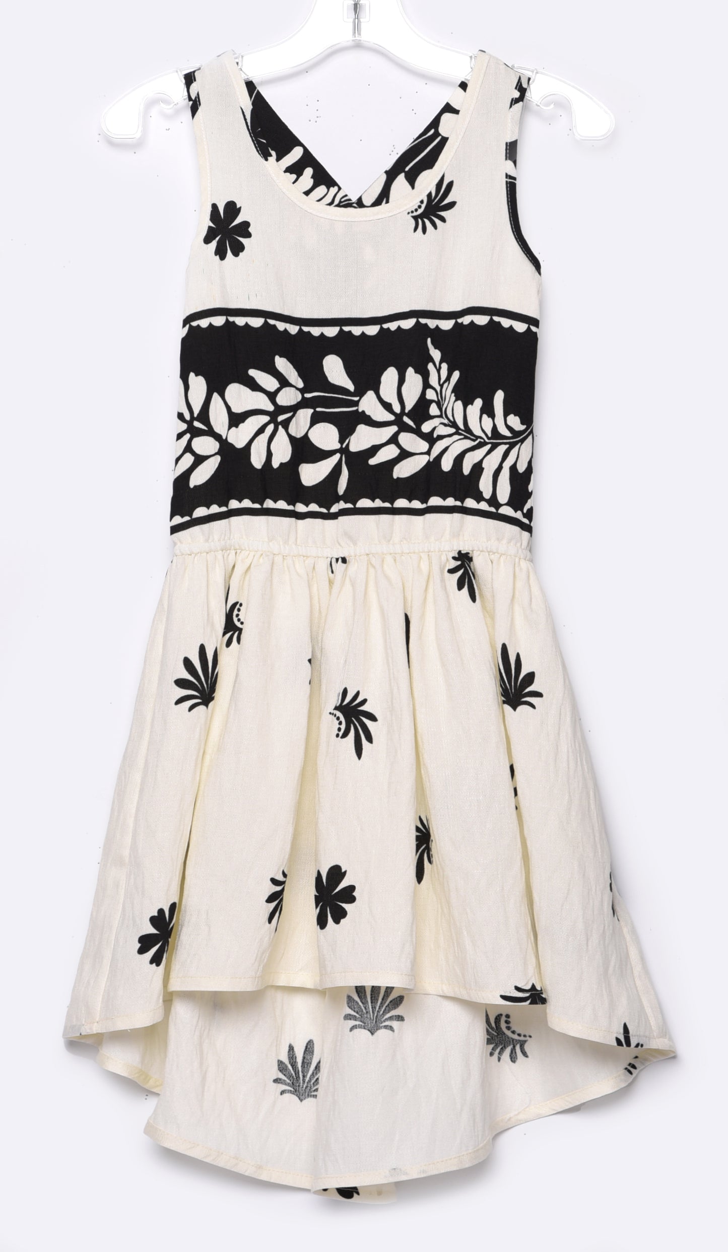 BORDER PRINT DRESS WITH CROSSED BACK STRAPS AND HIGH LOW HEM