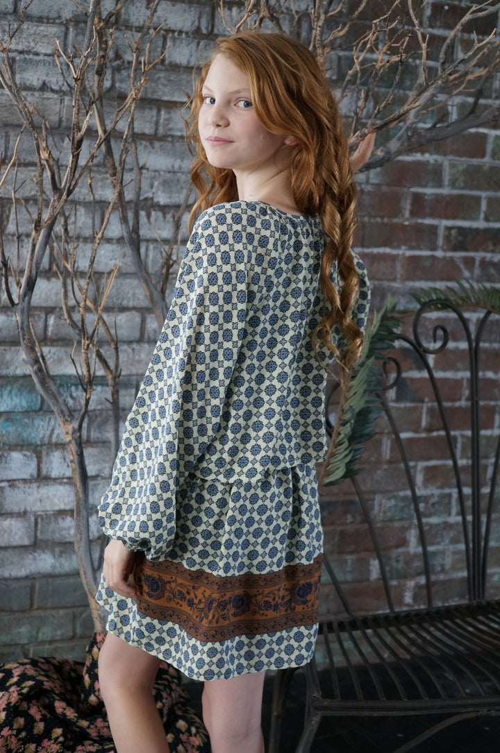 LONG SLEEVE SWING TOP OVERLAY DRESS WITH FAUX SUEDE TRIMMINGS