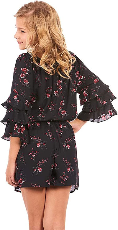 TRULY ME Big Girls Ruffle Sleeve Floral Print Romper  Ruffled Elastic Boat Neck (Can be work on of off the shoulder!)  3/4 Tiered Ruffle Sleeves  Burgundy, Pink, and White Floral Print  Drawstring Tassel Tie Waistline   The perfect romper for all seasons.