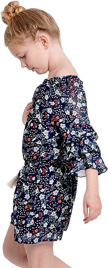 Big Girls Ruffle Sleeve Floral Print Romper  Ruffled Elastic Boat Neck (Can be work on of off the shoulder!)  3/4 Tiered Ruffle Sleeves  Burgundy, Pink, and White Floral Print  Drawstring Tassel Tie Waistline   The perfect romper for all seasons.  SELF: 100% Polyester, LINING: 100% Polyester