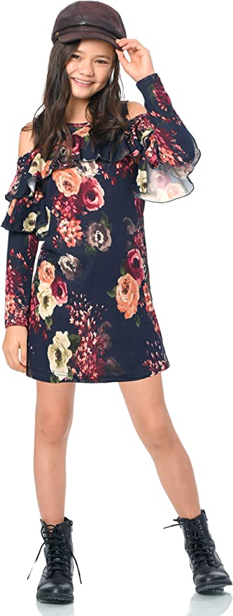 Big Girls Long Sleeve Cold Shoulder Floral Ruffle Dress Round neckline, easy pullover design Casual long sleeves with cold shoulder ruffle details Gorgeous vintage big rosette floral printed fabrication Right above the knee length Imported SELF: 100% Polyester, LINING: 97% Polyester, 3% Spandex Crinkled chiffon fabric with floral print and mettalic diamond shaped embellishing. Includes removable plaid collar with intricate stone work.