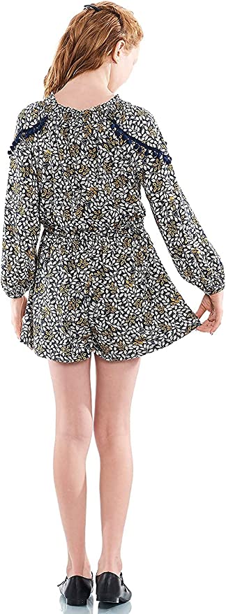Big Girl Leaf Boho Pom Pom Tassel Romper  Round Ruffled Neckline  Pom Pom & Tassel Trim on Chest & Shoulders   Long Sleeves  Elastic Waistline  Perfect Tones for Transitional Fall/Winter   SELF: 94% Polyester / 6% Spandex, LINING: 100% Polyester  Easy and comfortable long sleeve knit romper. Comes in high quality knit printed with navy multicolor floral print. Lined for her comfort.  Embellished with navy pompom trim and colorful navy and yellow contrast tassel ties. 