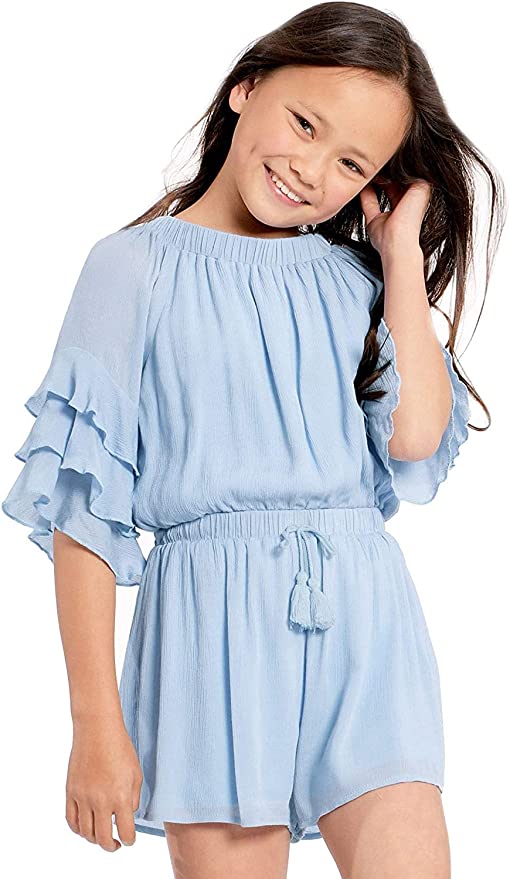 Big Girls Ruffle Sleeve Baby Blue Romper  Ruffled Elastic Boat Neck (Can be work on of off the shoulder!)  3/4 Tiered Ruffle Sleeves  Drawstring Tassel Tie Waistline   The perfect romper for all seasons.  SELF: 100% Rayon, LINING: 100% Polyester  Rayon gauze fabrication with soft hand-feel.
