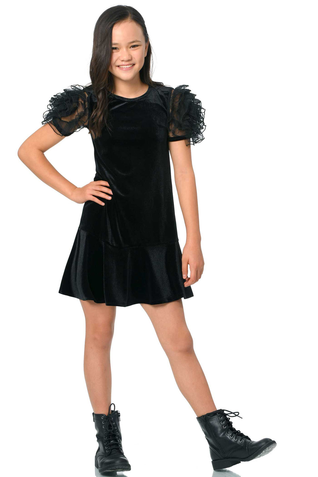 Girls Mesh Frill Short Sleeve Velvet Dress Round neckline, easy pullover design Beautiful mesh frill 3D flower-shaped short sleeves Soft comfy velvet fabrication, perfect for the fall-winter holiday season Right above the knee length Imported SELF: 95% Polyester / 5% Spandex Sleeveless skater dress in high quality scuba. One-of-a-kind artwork with floral and butterfly graphics done with sublimation printing.