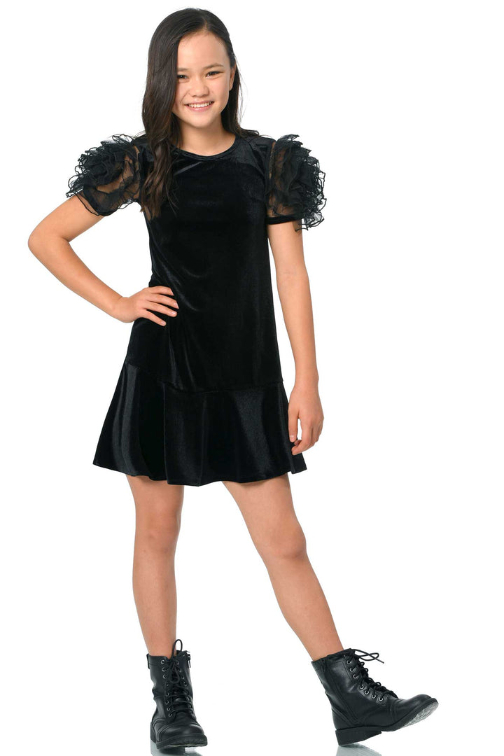 Girls Mesh Frill Short Sleeve Velvet Dress Round neckline, easy pullover design Beautiful mesh frill 3D flower-shaped short sleeves Soft comfy velvet fabrication, perfect for the fall-winter holiday season Right above the knee length Imported SELF: 95% Polyester / 5% Spandex Sleeveless skater dress in high quality scuba. One-of-a-kind artwork with floral and butterfly graphics done with sublimation printing.