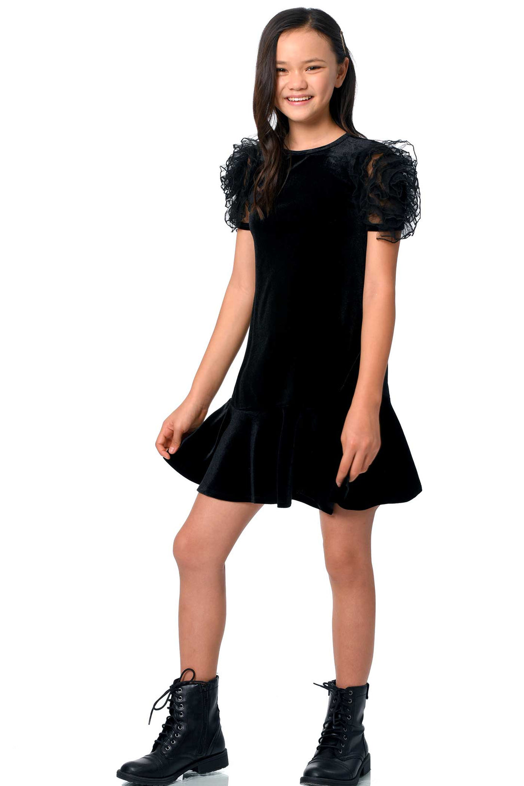 Girls Mesh Frill Short Sleeve Velvet Dress Round neckline, easy pullover design Beautiful mesh frill 3D flower-shaped short sleeves Soft comfy velvet fabrication, perfect for the fall-winter holiday season Right above the knee length Imported SELF: 95% Polyester / 5% Spandex Sleeveless skater dress in high quality scuba. One-of-a-kind artwork with floral and butterfly graphics done with sublimation printing.