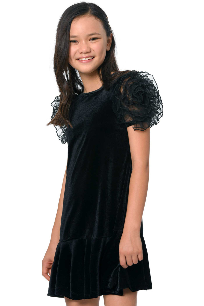 Girls Mesh Frill Short Sleeve Velvet Dress Round neckline, easy pullover design Beautiful mesh frill 3D flower-shaped short sleeves Soft comfy velvet fabrication, perfect for the fall-winter holiday season Right above the knee length Imported SELF: 95% Polyester / 5% Spandex Sleeveless skater dress in high quality scuba. One-of-a-kind artwork with floral and butterfly graphics done with sublimation printing.