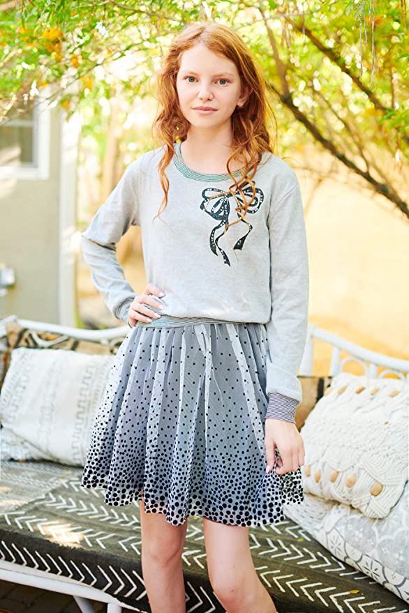 Big Girls Bow Polka Dot Twofer Dress  Rounded/Semi Boat Neckline  Long Sleeves  Stripe Contrast Trim on Neck, Cuffs, and Hem  Bow Rhinestone Graphic Print on Chest  Color Block Gradient Polka Dot  Lined Interior Skirt  A Perfect Everyday Dress or Semi Dressy.   