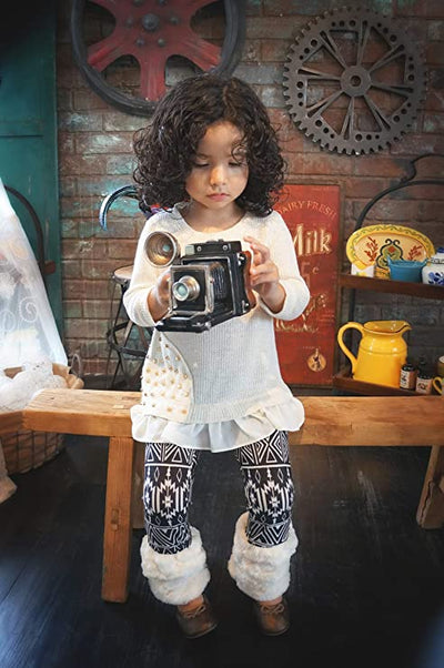 Little Girls Boho Tribal Print Faux Fur Leggings  Elastic Waistline  Ivory & Black Boho Tribal Print  Faux Fur Leg Warmers   The Perfect Leggings to Keep the Little Ones Warm During Fall & Winter.  SELF: 97% Polyester / 3% Spandex, CONTRAST (FAUX FUR): 100% Polyester  Made in high quality jersey knit.