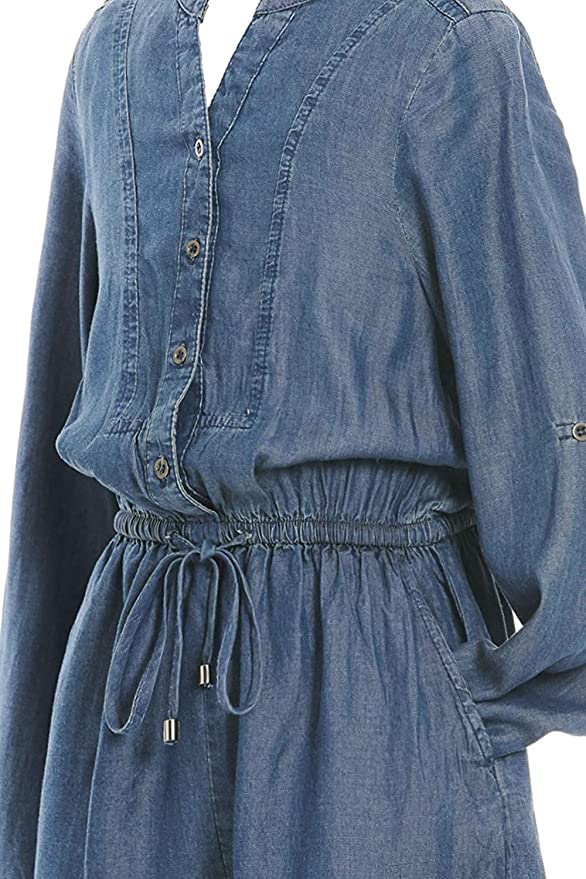 TRULY ME Big Girls Denim Long Sleeve Romper  Mandarin Collar V Neckline  Button Details Down Front Torso  Long Sleeves That Can Be Rolled Up  Elastic Waistline  Perfect Material for all Seasons: Spring,Summer,Fall, and Winter Romper.  50% Cotton / 50% Lyocell  Long sleeve chambray denim romper with many intricate details. Fabric is a super soft, cooling, and high quality woven.