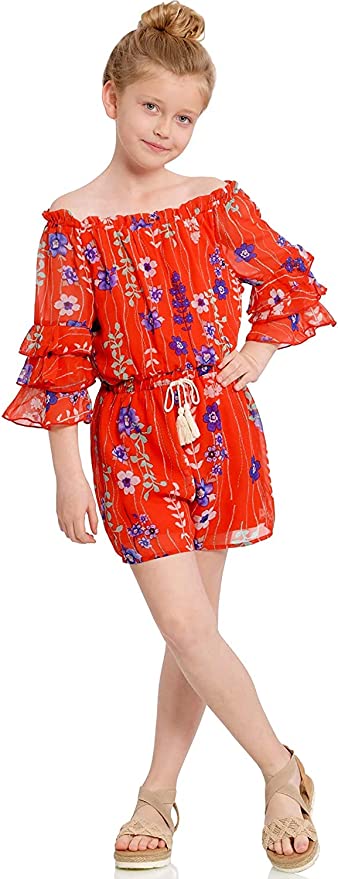 Big Girls Ruffle Sleeve Floral Print Romper  Ruffled Elastic Boat Neck (Can be work on of off the shoulder!)  3/4 Tiered Ruffle Sleeves  Burgundy, Pink, and White Floral Print  Drawstring Tassel Tie Waistline   The perfect romper for all seasons.  100% Polyester  SELF: 100% Polyester, LINING: 100% Polyester  Versatile romper that can be worn on and off the shoulder. Comes in a high quality chiffon fabrication. Super soft knit lining included.