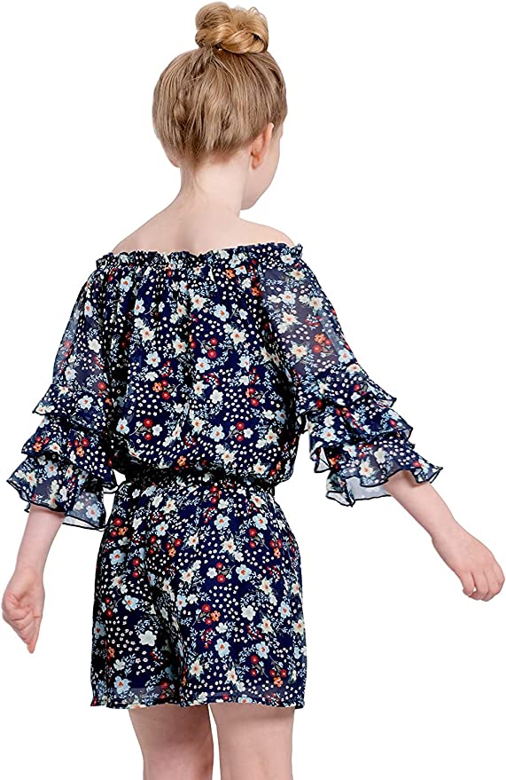 Big Girls Ruffle Sleeve Floral Print Romper  Ruffled Elastic Boat Neck (Can be work on of off the shoulder!)  3/4 Tiered Ruffle Sleeves  Burgundy, Pink, and White Floral Print  Drawstring Tassel Tie Waistline   The perfect romper for all seasons.  SELF: 100% Polyester, LINING: 100% Polyester