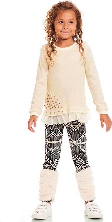 Little Girl’s Thin Knit Gold Stud Ruffle Pullover  Round Neckline   Long Sleeves   Thin Knit Material   Faux Layered Ruffle Hem Look  Gold Embellishments on Side  SELF: 88% Acrylic / 12% Lurex, CONTRAST: 100% Polyester, LINING: 100% Polyester  Made in high quality sweater knit fabrication with gold metallic thread.