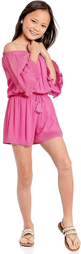 Big Girls Ruffle Sleeve Baby Blue Romper  Ruffled Elastic Boat Neck (Can be work on of off the shoulder!)  3/4 Tiered Ruffle Sleeves  Drawstring Tassel Tie Waistline   The perfect romper for all seasons.  SELF: 100% Rayon, LINING: 100% Polyester  A versatile romper that can be worn on and off the shoulder. Made in high quality rayon gauze fabrication. Lining is a super soft lightweight knit.