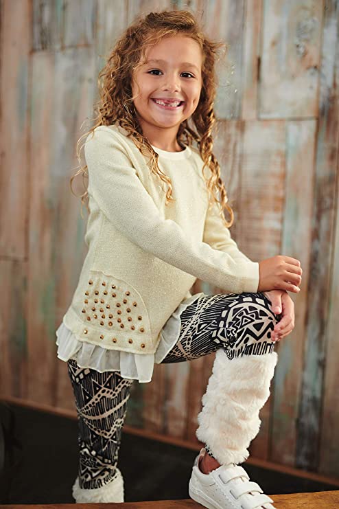 Little Girls Boho Tribal Print Faux Fur Leggings  Elastic Waistline  Ivory & Black Boho Tribal Print  Faux Fur Leg Warmers   The Perfect Leggings to Keep the Little Ones Warm During Fall & Winter.  SELF: 97% Polyester / 3% Spandex, CONTRAST (FAUX FUR): 100% Polyester  Made in high quality jersey knit.