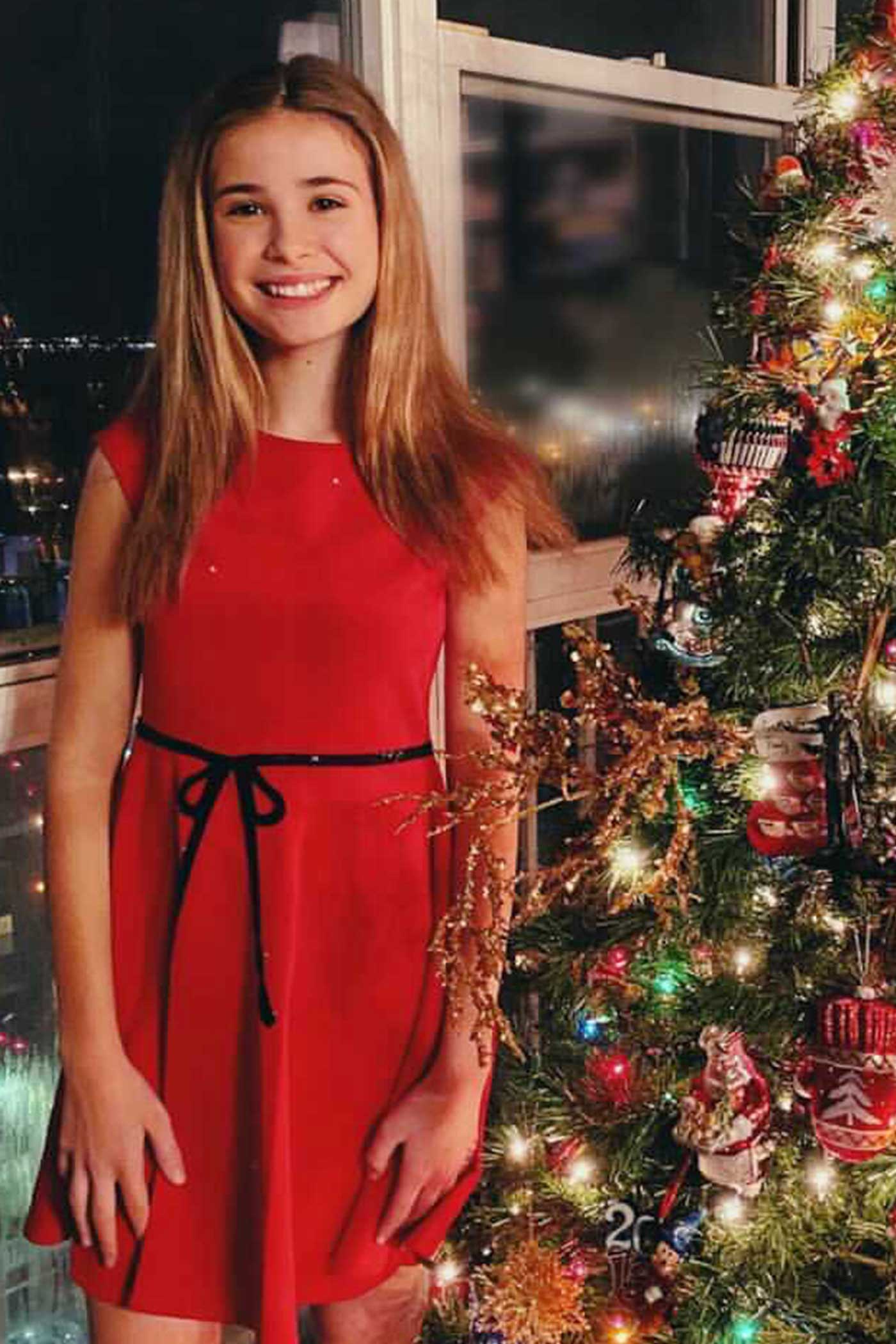 Hannah Banana fit and flare skater dress with sequin bow trim at the waist