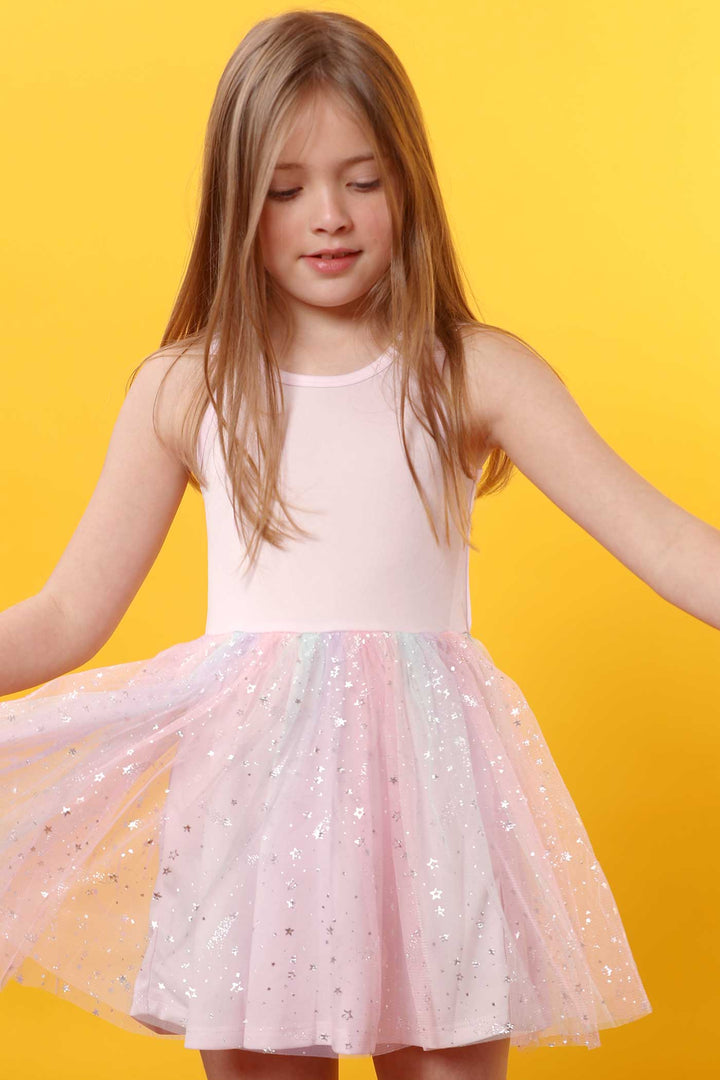 Truly Me Little Girls Star Unicorn Theme Twofer Dress Twofer dress, or two-for-one top and dress set Sleeveless knit top includes clean round neckline and front tie detail Top also comes with bold Unicorn Star theme patch made of flip over sequins Sleeveless tutu dress comes in a fit and flare silhouette Dress is made from high quality knit fabric and star shimmer multicolor mesh Skirt portion of dress is lined for her comfort Imported