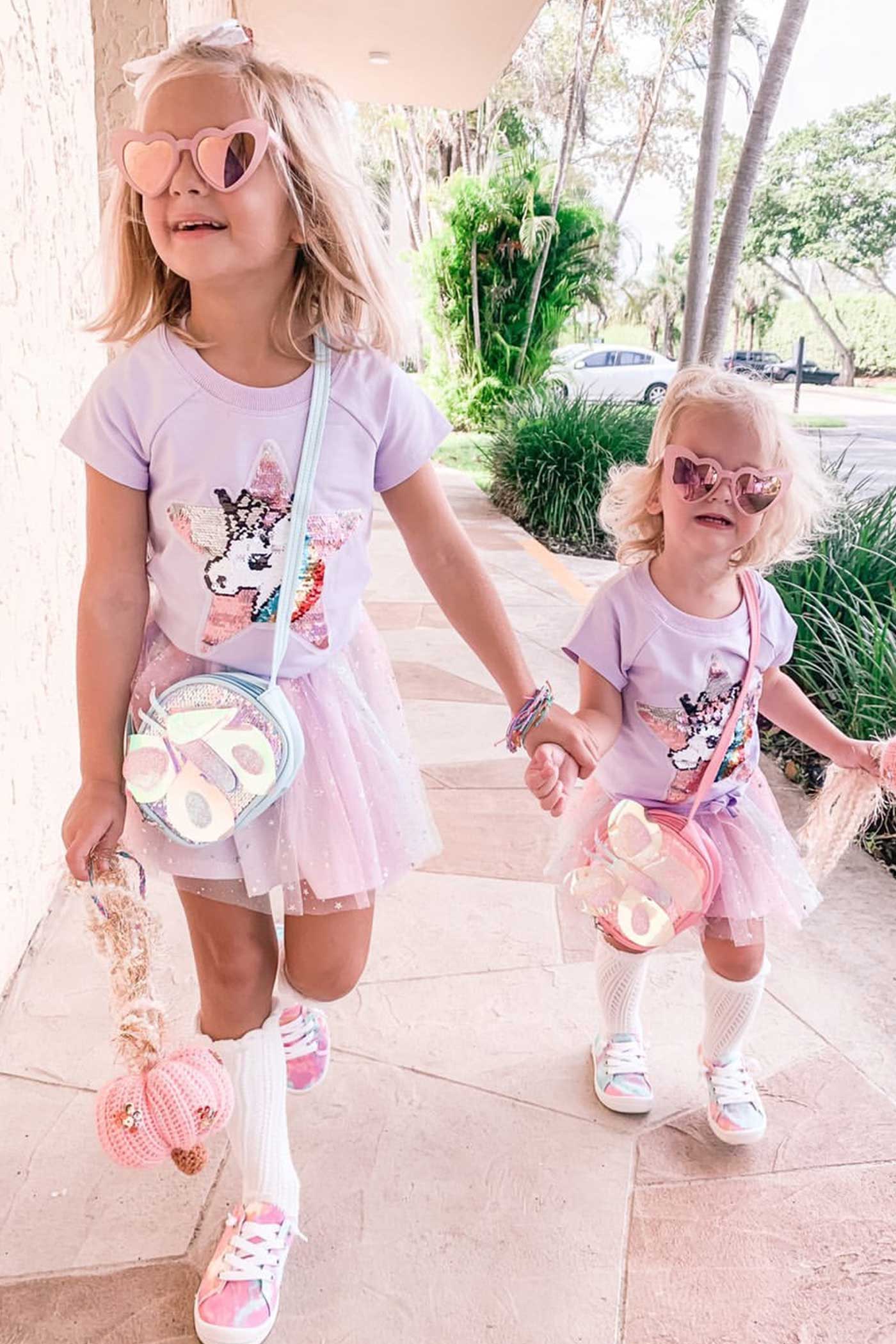 Truly Me Little Girls Star Unicorn Theme Twofer Dress Twofer dress, or two-for-one top and dress set Sleeveless knit top includes clean round neckline and front tie detail Top also comes with bold Unicorn Star theme patch made of flip over sequins Sleeveless tutu dress comes in a fit and flare silhouette Dress is made from high quality knit fabric and star shimmer multicolor mesh Skirt portion of dress is lined for her comfort Imported