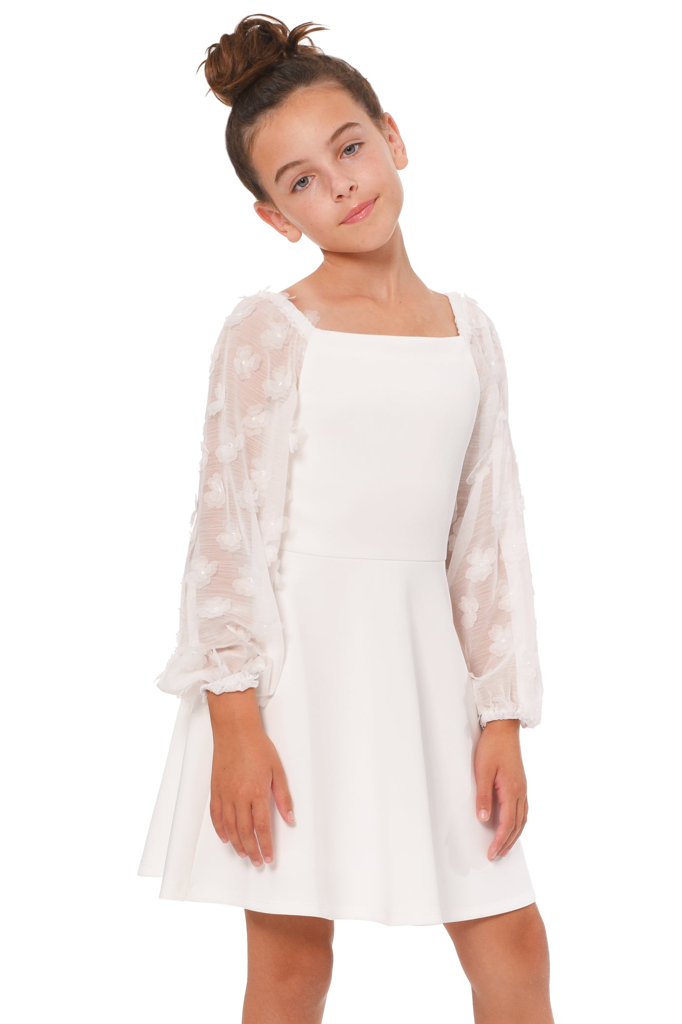 Truly Me Big Girls Floral Long Sleeve Skater Dress Big Girls 3D Floral Long Sleeve Skater Dress Wear two way style: on and off the shoulder neckline Elegant long sleeves made with floral embellished novelty fabric Flattering fit and flare silhouette High quality white scuba knit fabric Exposed back zipper Imported