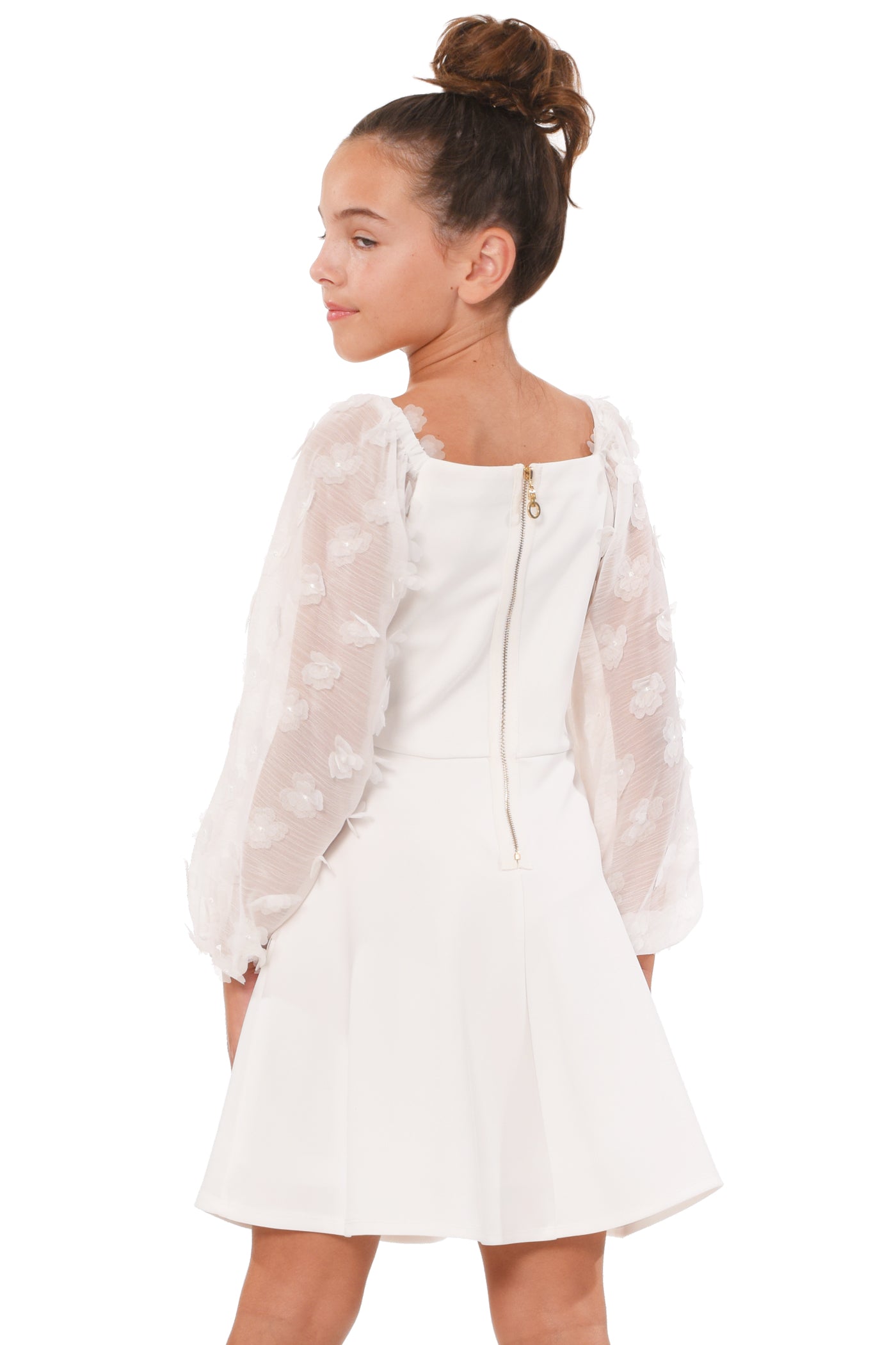 Truly Me Big Girls Floral Long Sleeve Skater Dress Big Girls 3D Floral Long Sleeve Skater Dress Wear two way style: on and off the shoulder neckline Elegant long sleeves made with floral embellished novelty fabric Flattering fit and flare silhouette High quality white scuba knit fabric Exposed back zipper Imported