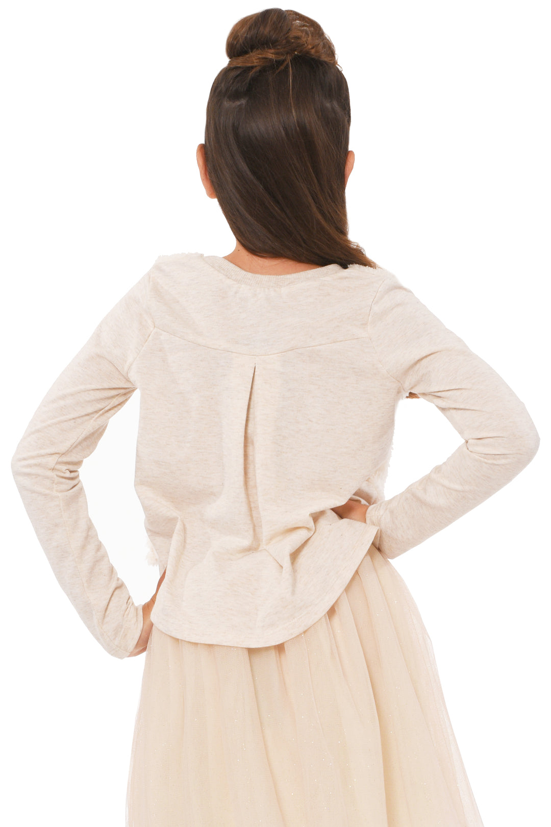 Truly Me Girls LOVE Graphic High-Low Top Simple, round neck line Long sleeves A flattering high-low silhouette with fabric blocking Made of a high quality faux fur and heather knit Front bodice includes the faux fur and LOVE graphic LOVE graphic made with a gold sequin heart  Imported