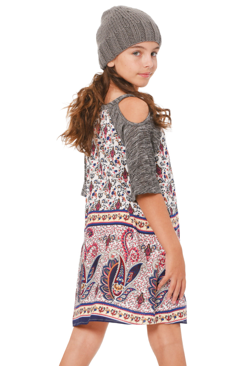 Truly Me Big Girls Cold Shoulder A-Line Dress Raglan style silhouette with round neckline Cold shoulders with short sleeves Sleeves and neckline are made of a high quality sweater knit Main dress body is made of a super soft rayon challis Unique floral paisley boarder print Lined for her comfort Imported
