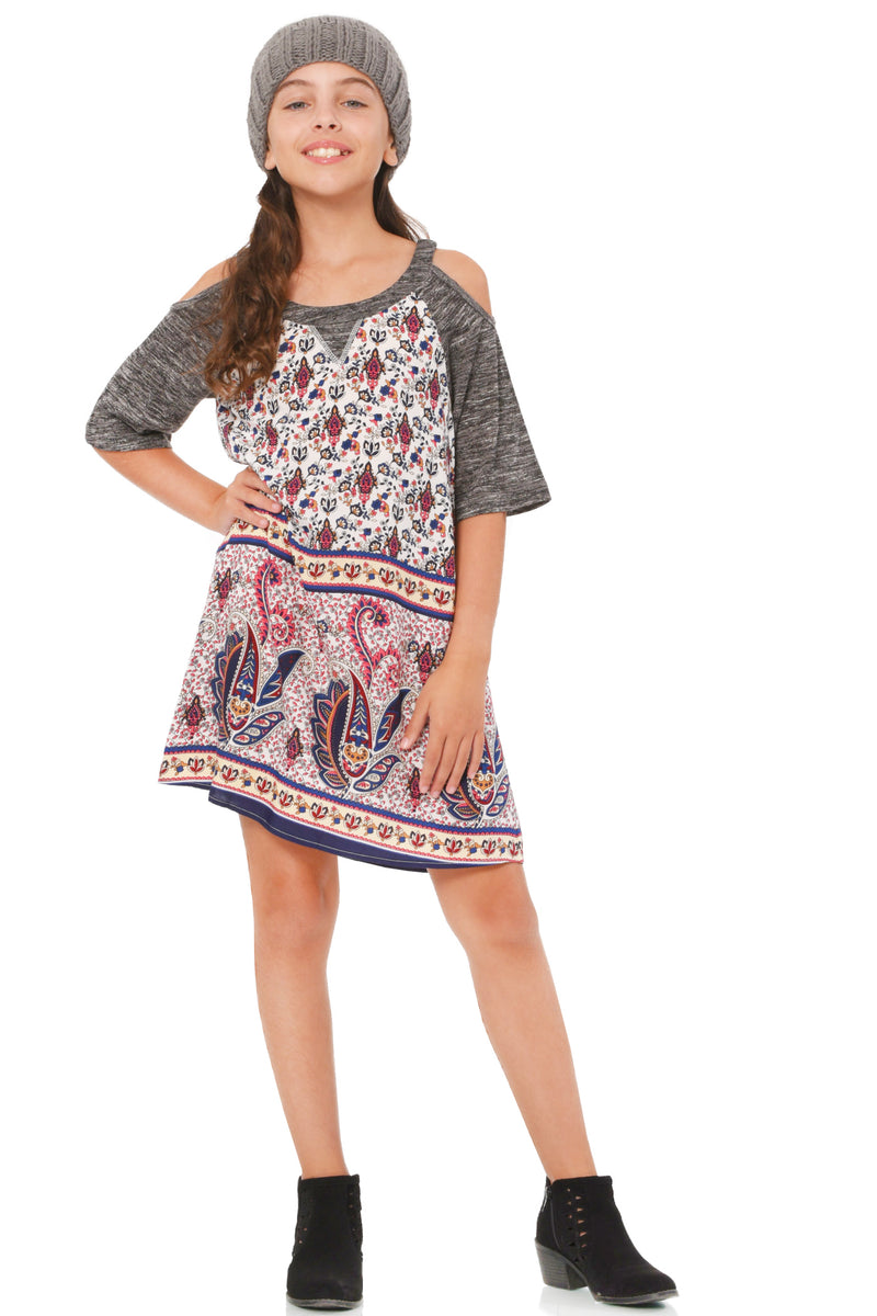 Truly Me Big Girls Cold Shoulder A-Line Dress Raglan style silhouette with round neckline Cold shoulders with short sleeves Sleeves and neckline are made of a high quality sweater knit Main dress body is made of a super soft rayon challis Unique floral paisley boarder print Lined for her comfort Imported